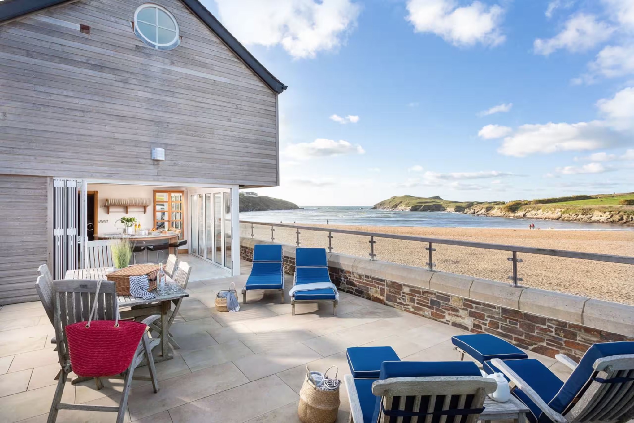 The Sail Loft terrace overlooking the beach