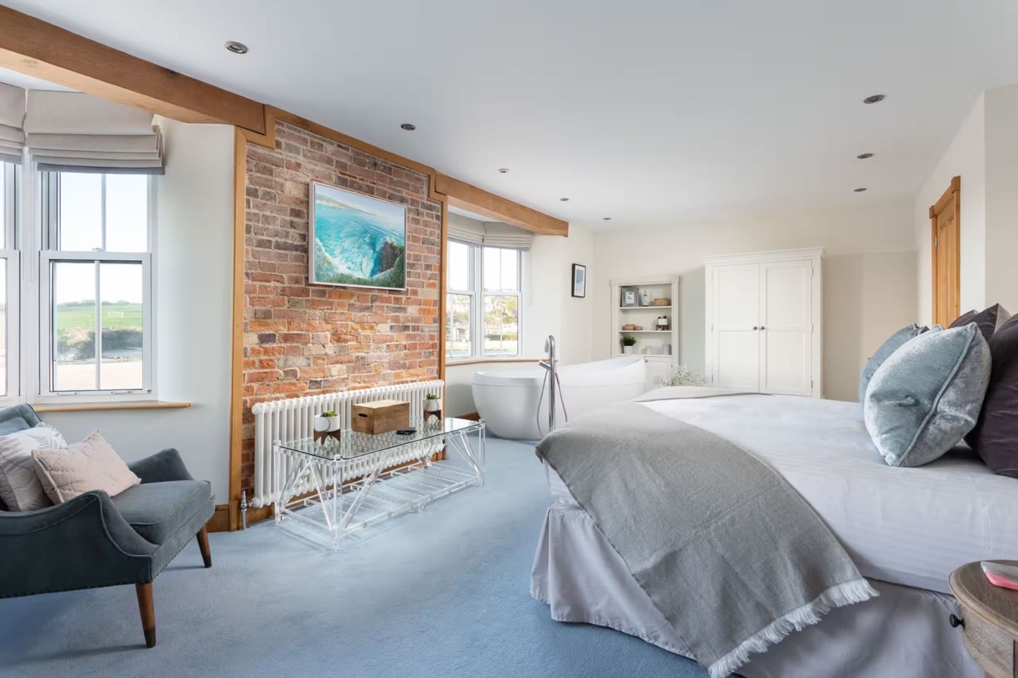 Principal bedroom with bath and bay views